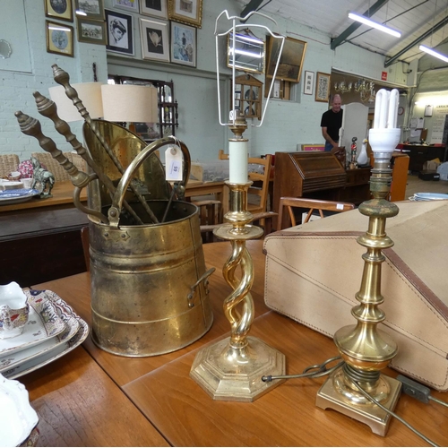 65 - A pair of brass candlestick electric table lamps, brass coal chute, fire implements etc...