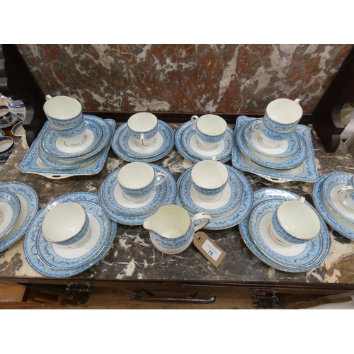 76 - A blue, white and gilt bordered Fenton china tea set