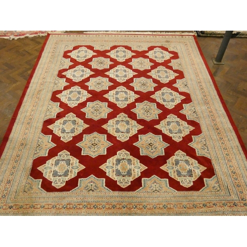 168 - A large Persian red and fawn silk pile rug, 10'6 x 8'3