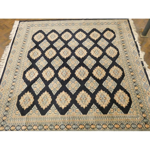 169 - A large blue and fawn pattern Persian style rug, 8'3 x 7'9