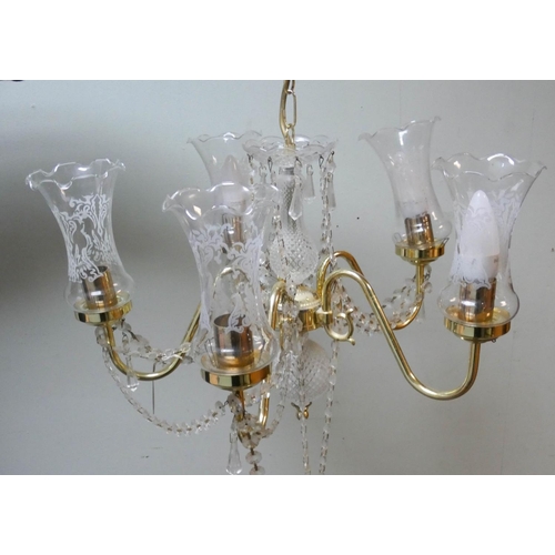 176 - A set of three five branch brass and glass lustre chandeliers