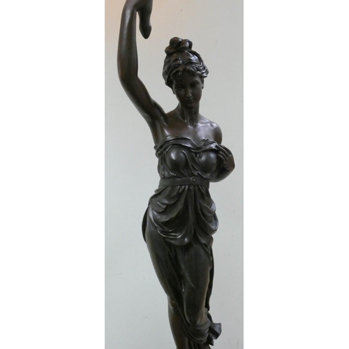 201 - An impressive tall bronze finish lady figure holding a lamp, 80