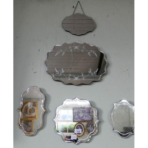 118 - Five assorted small shaped frameless wall mirrors