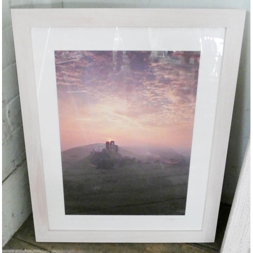 122 - A contemporary framed print of African scene and an atmospheric photograph of Corfe Castle