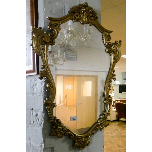 131 - A Victorian style shaped wall mirror and a long framed Japanese print