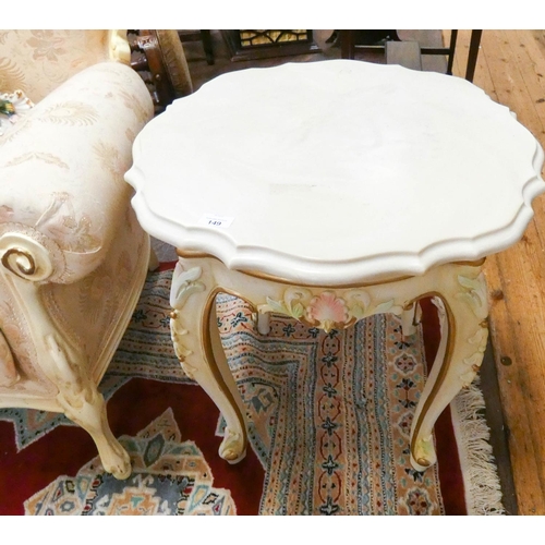 149 - A pair of Italian circular cream, gilt and floral painted bedside or lamp tables