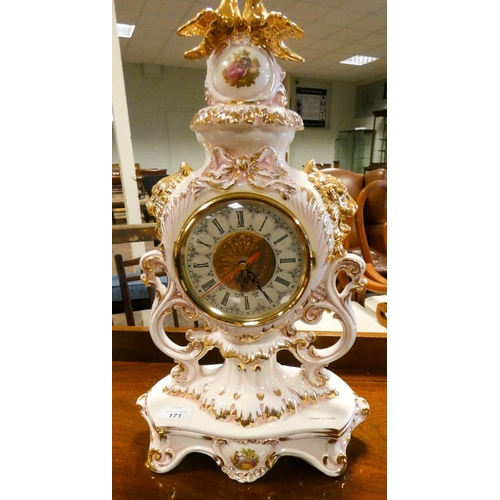 171 - An Italian cream floral and gilt decorated mantel clock