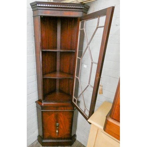 47 - A reproduction mahogany part glazed corner display cabinet with cupboard under