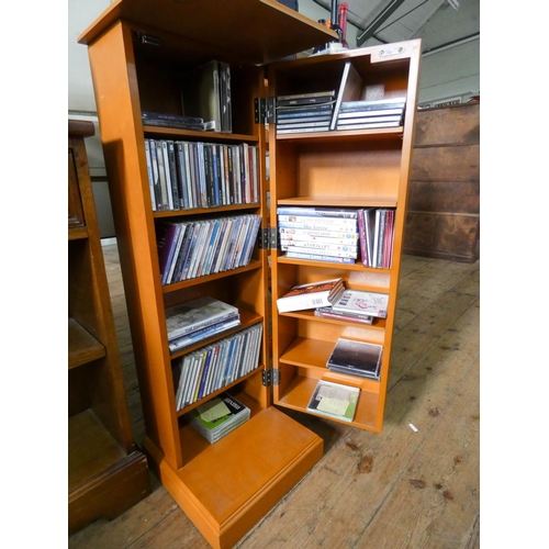 98 - A modern teak finished CD cabinet with a quantity of CD's