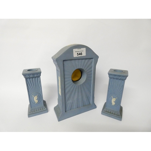 546 - Wedgwood blue Jasper Millennium mantel clock and pair of matching candle holders