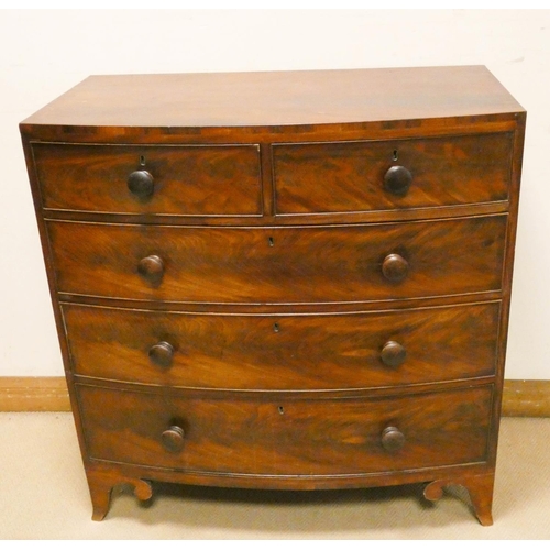 258 - A late Georgian mahogany bow front chest of three long and two short drawers with later Victorian bu... 