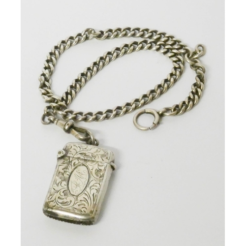 469 - A silver watch Albert chain with attached silver vesta. Gross weight 1.4 troy oz.