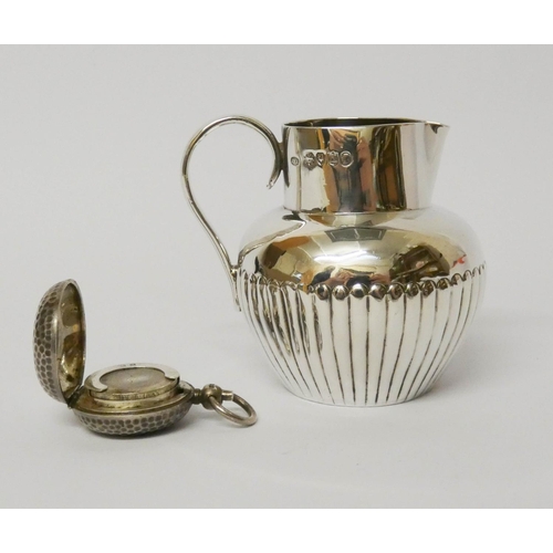 473 - Victorian silver cream jug of half lobed form, London 1885, and a silver sovereign case, gross weigh... 