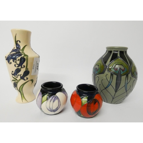 487 - Moorcroft - Three pieces of modern pottery - Peacock Parade vase, Bluebell Harmony vase and a small ... 