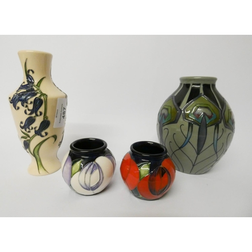 487 - Moorcroft - Three pieces of modern pottery - Peacock Parade vase, Bluebell Harmony vase and a small ... 