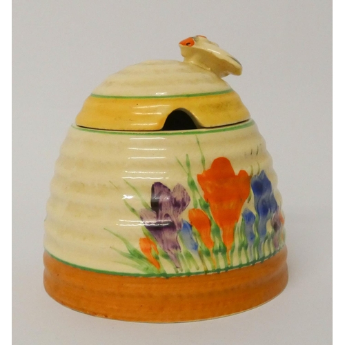 494 - A Clarice Cliff crocus pattern honey box and cover