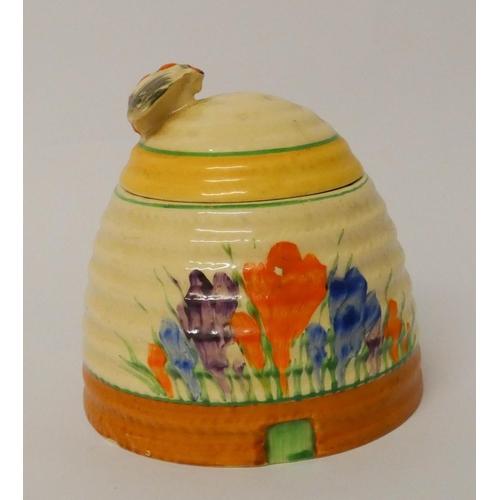 494 - A Clarice Cliff crocus pattern honey box and cover