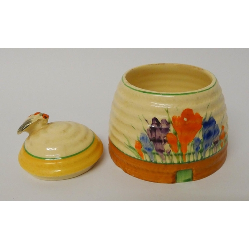 494 - A Clarice Cliff crocus pattern honey box and cover