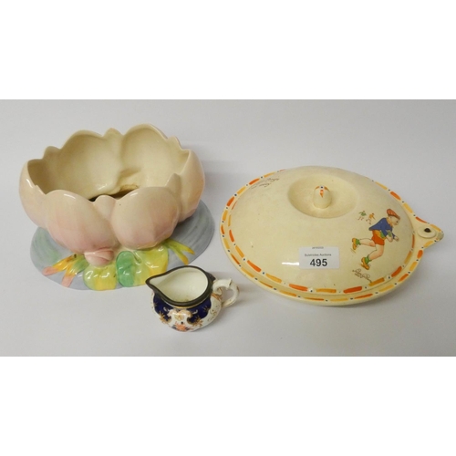 495 - A Clarice Cliff water Lily table centre piece, Georgy Porgy Peggy Gibbons plate warmer and a small c... 