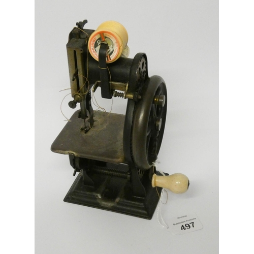 497 - A DORMAN LOCKSTITCH MINIATURE SEWING MACHINE serial number 8818, the front plate marked 'The Dorman ... 