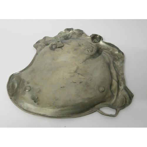 547 - Art Nouveau pewter shallow dish, in the style of WMF. 26 cms tall.