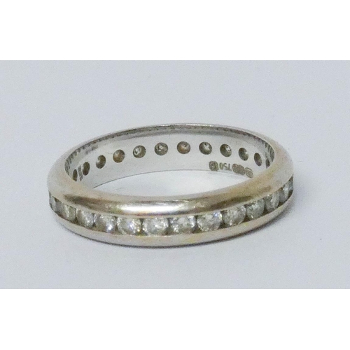 628 - 18ct white gold diamond eternity ring, fully set with channel set brilliant cut diamonds, ring size ... 