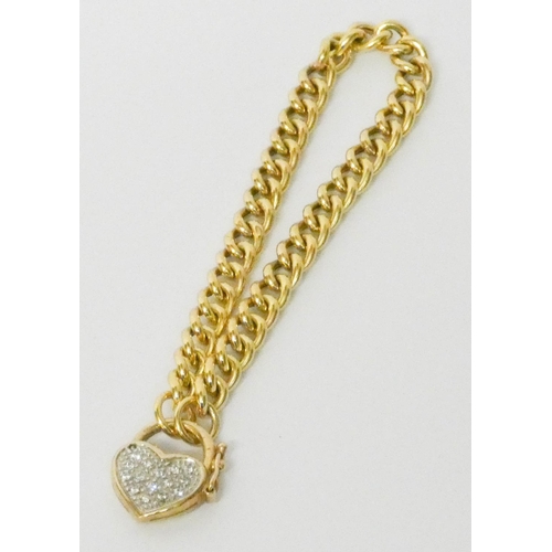 678 - A 9ct yellow gold curb chain bracelet, with CZ set heart shaped fastening, heart marked 9kt. 10 gram... 