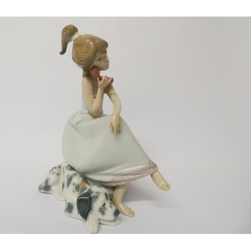 558 - A Lladro figurine of a girl on a telephone ' Chit Chat' with original box