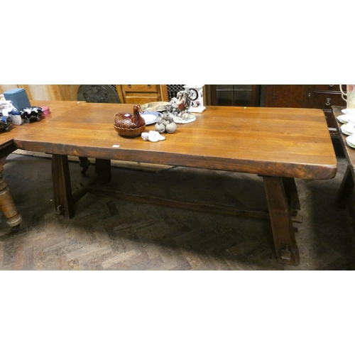 301 - A large  plank topped refectory trestle type dining table, 6'6 X 2'9 approximately