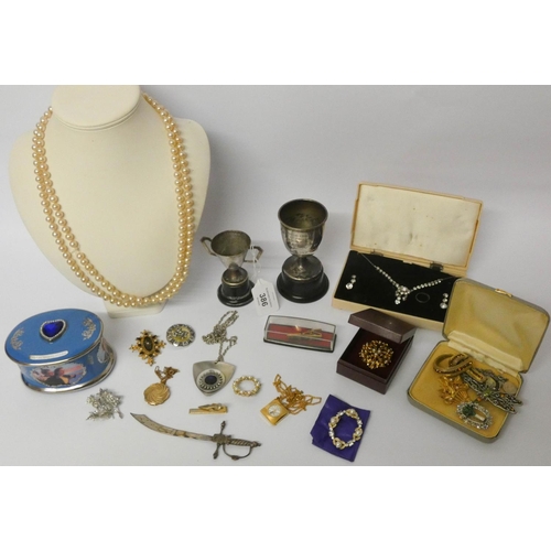 386 - Modern Titanic china musical box, two silver plated trophy cups and a quantity of costume and paste ... 