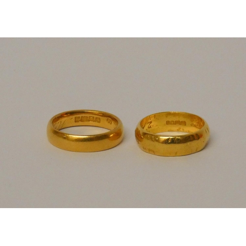 609 - Two 22ct yellow gold wedding bands, Size L, weight 12.1 grams