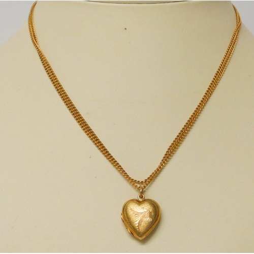 611 - 9ct gold chain and 9ct heart shaped locket, weight 8.1 grams. Chain length 70 cms,