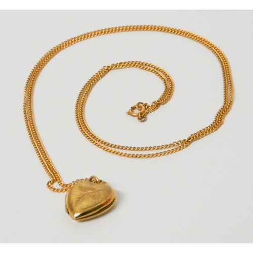 611 - 9ct gold chain and 9ct heart shaped locket, weight 8.1 grams. Chain length 70 cms,