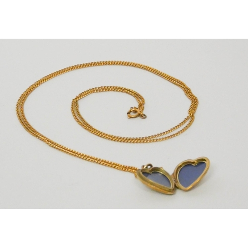 611 - 9ct gold chain and 9ct heart shaped locket, weight 8.1 grams. Chain length 70 cms,