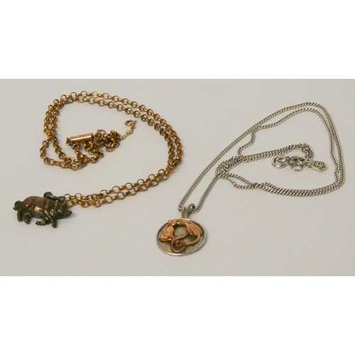 593 - Clogau gold and silver disc pendant on silver chain, and a pig pendant on Victorian 9ct gold belcher... 