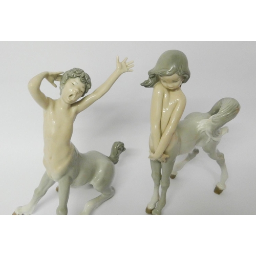 440 - Lladro - a pair of porcelain boy and girl Centaur figures, tallest measuring 22cm high