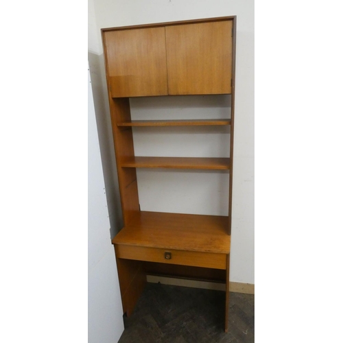 20 - A 1970's GPlan teak bookcase with cupboard top and drawer under