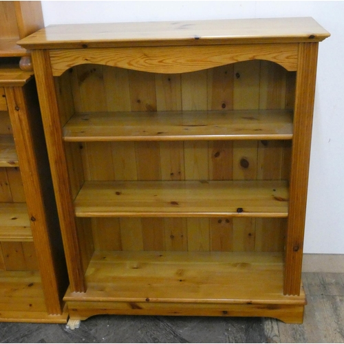 24 - A low modern pine open bookcase, 34