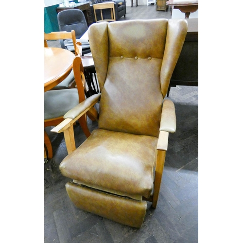 33 - A vintage Bodiline Popular reclining extending fireside chair in faux leather covering