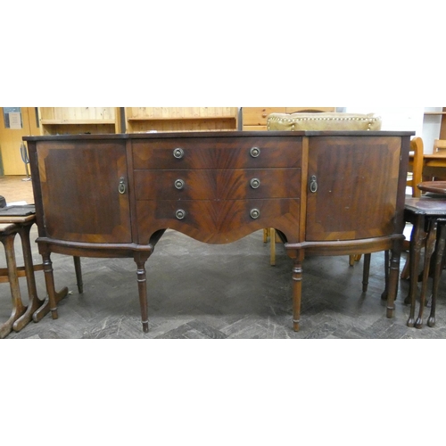 62 - A Georgian style shaped front mahogany sideboard with centre drawers and cupboards, 5'6 wide