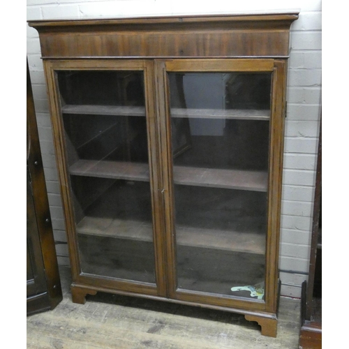 71 - An inlaid mahogany glazed two door bookcase, 3'6 wide