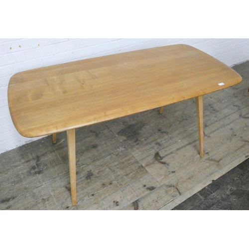 1 - An Ercol light elm dining table, 5' x 2'6