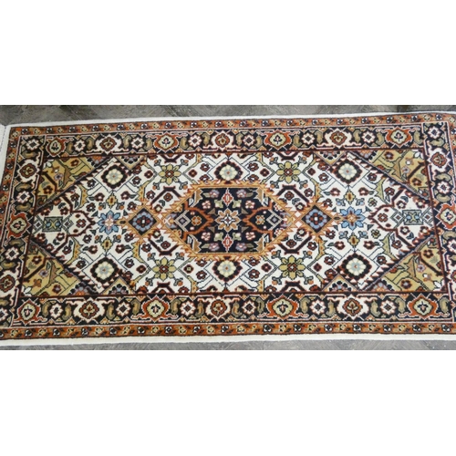 122 - A wool pile Persian design rug