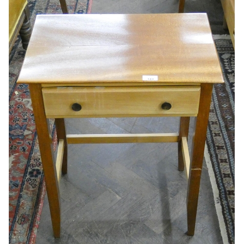 149 - A small teak occasional table fitted drawer