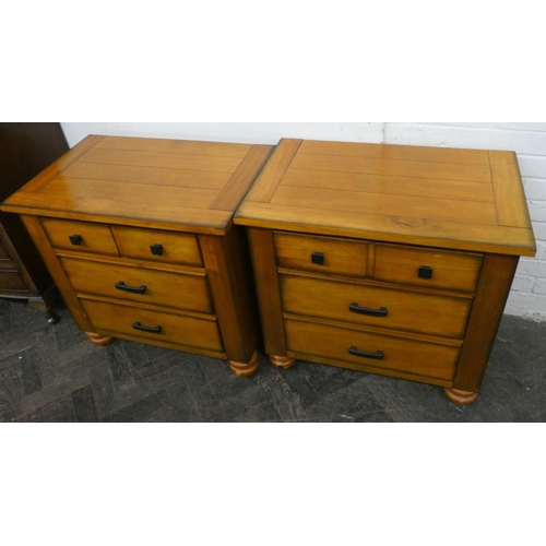 219 - A pair of modern large bedside cabinets, fitted three drawers each