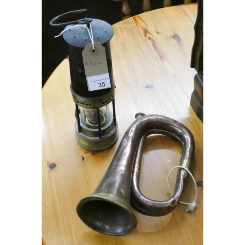 35 - A miners safety lamp and a copper bugle