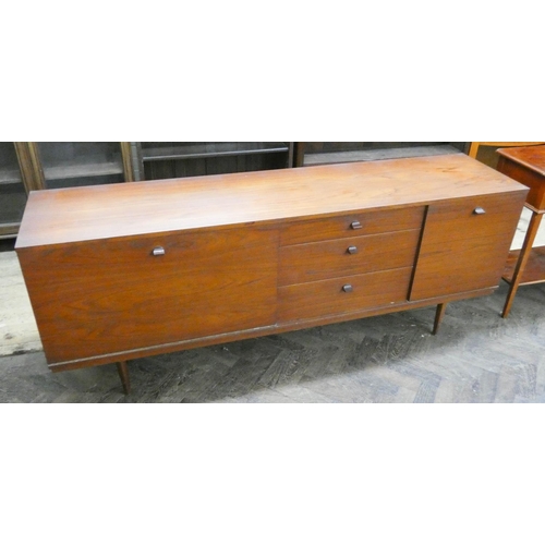 92 - A 1960's/70's Avalon long low teak sideboard, fitted three centre drawers and cupboards, 6' long