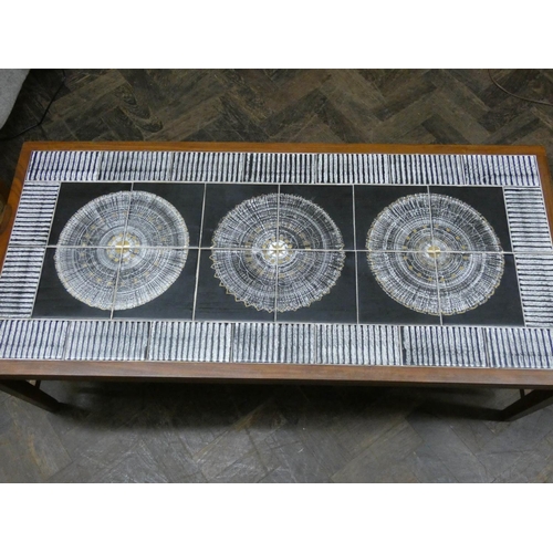 101 - A retro tile top long teak coffee table with under tier