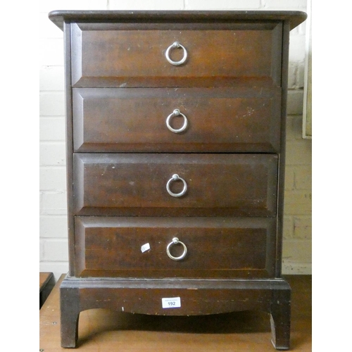 192 - A Stag minstrel mahogany tall bedside cabinet fitted four drawers