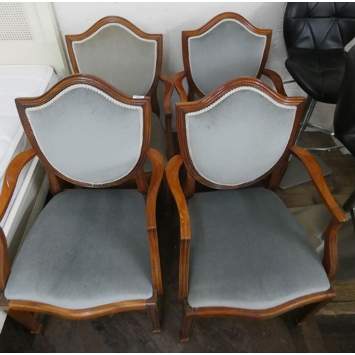 237 - A set of four yew wood elbow or carved chairs upholstered in pale green Dralon